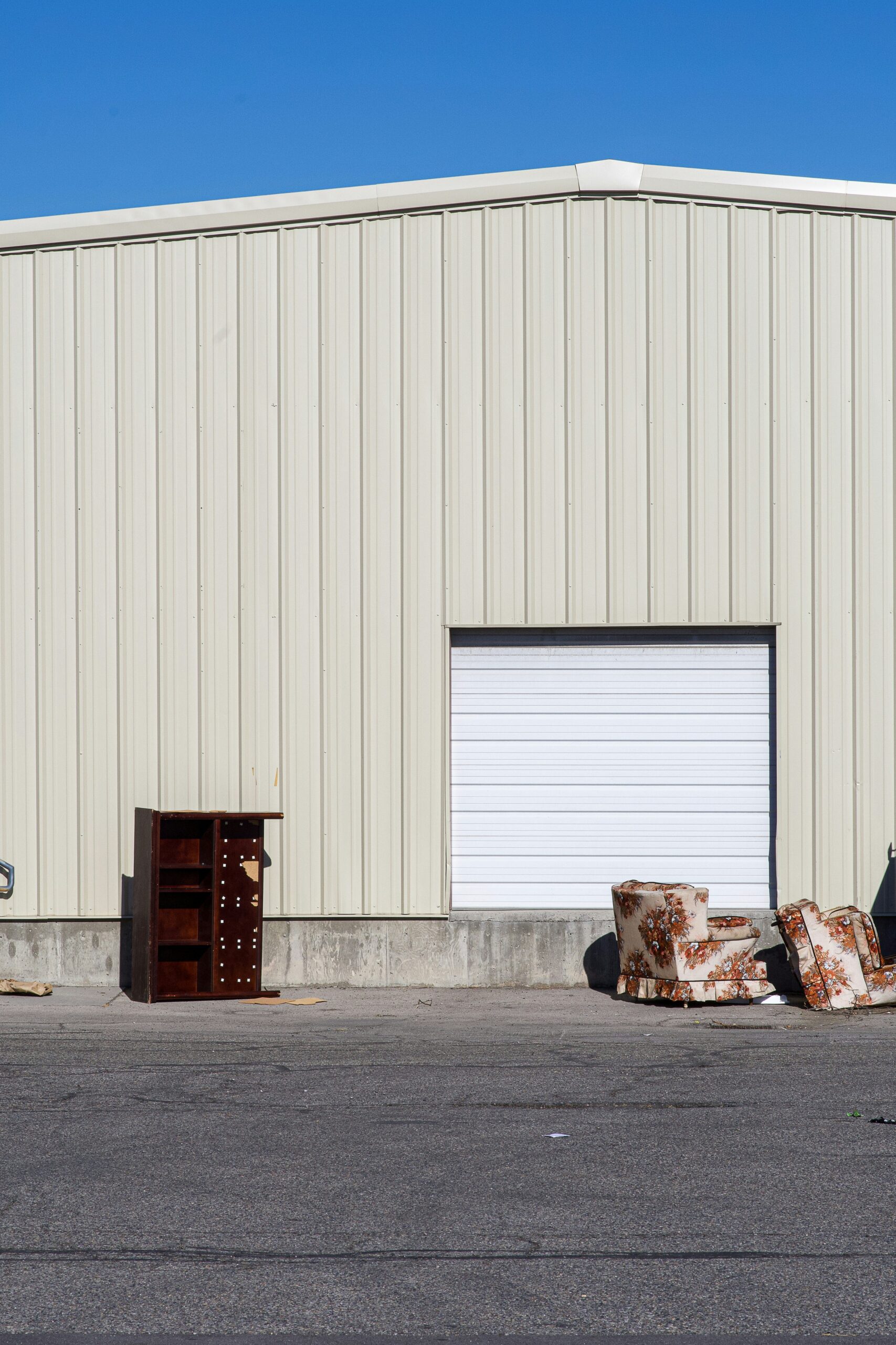 brown wooden box near white wall