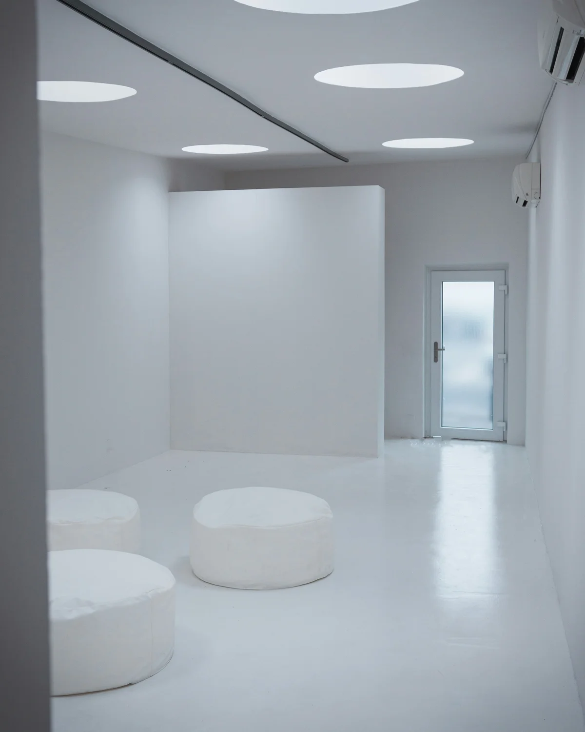 Hyper-realistic architectural photography, completed modular clean room facility with pristine white composite wall panels, fully operational pharmaceutical production environment, long-term value and ROI concept, clean lines and durable surfaces, energy-efficient LED lighting, wide-angle interior view showing scale and quality, professional commercial photography, no text, no brand logo