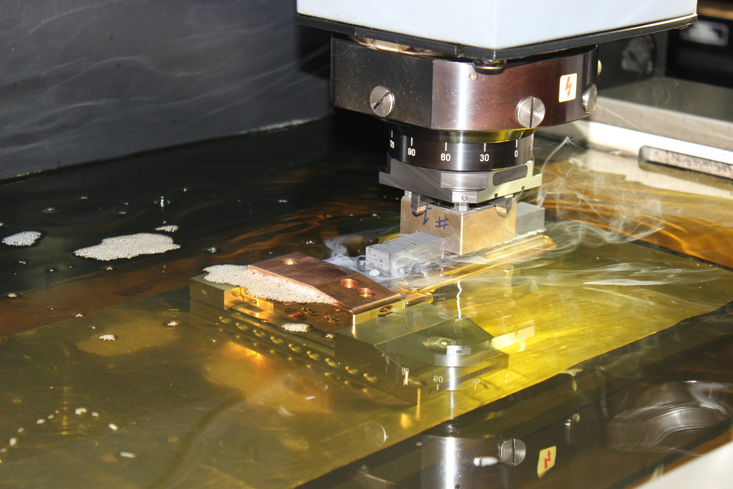 Hyper-realistic photography of a CFRT PU panel undergoing precision CNC machining, with a focus on the clean cut edge and the precise thickness of the panel. A digital caliper or measuring tool could be subtly visible near the edge. Industrial workshop lighting, clean composition, no text, no brand logo.