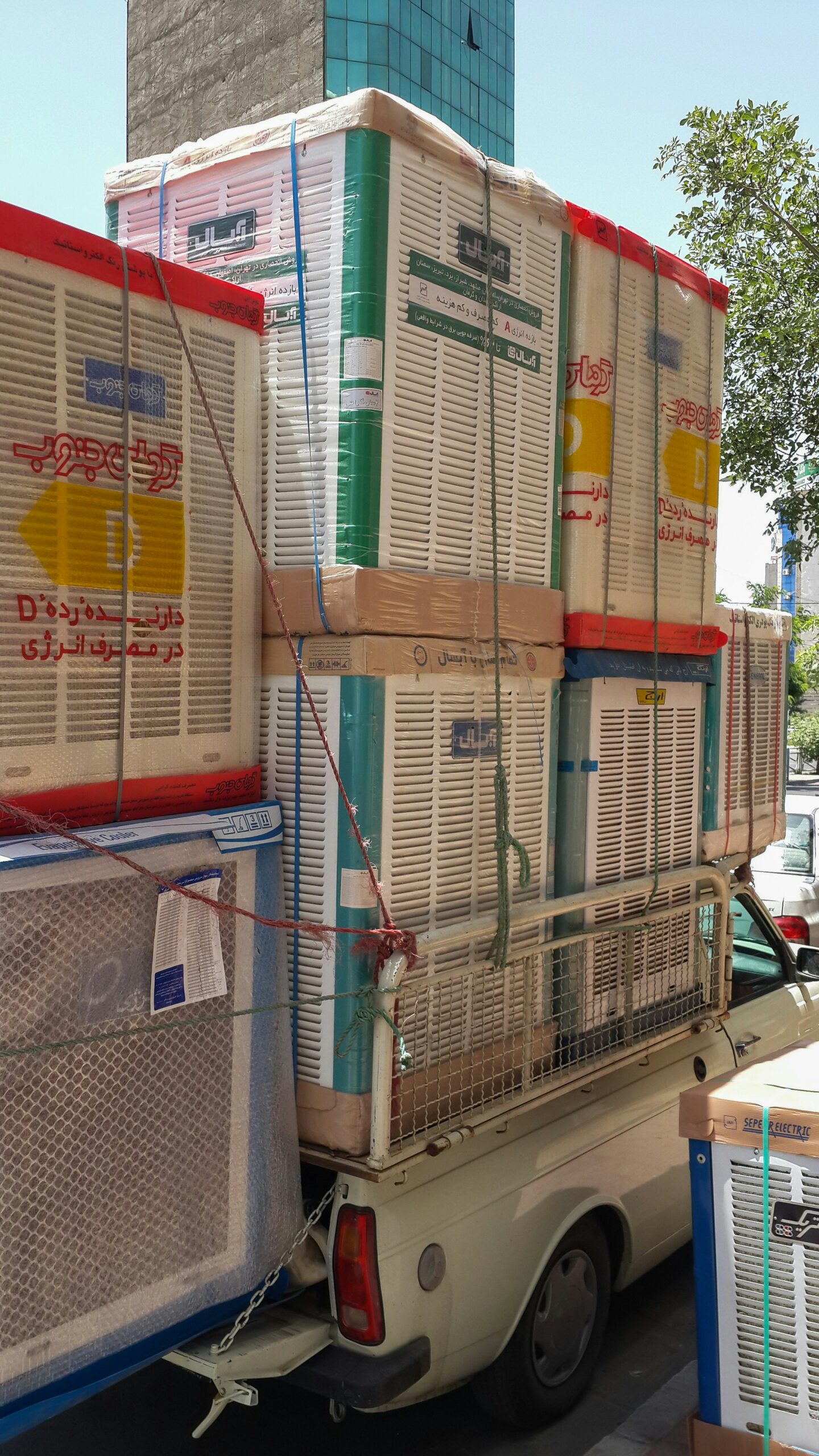 Hyper-realistic photography of a custom RV composite panel being carefully loaded into reinforced, specialized packaging designed for international shipping. The packaging is robust and clearly built for protection during long transit. The panel itself is visible, showcasing its custom features. Warehouse setting, natural light, clean composition, no text, no brand logos.