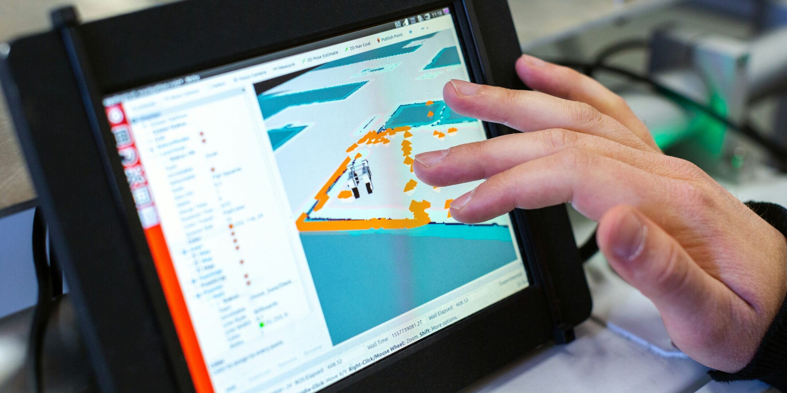 Hyperrealistic Photography Of An Engineer Or Designer Review Example Hyper-realistic photography of an engineer or designer reviewing technical specifications and blueprints for fire-rated composite panels on a digital tablet or large screen. Various panel samples and material swatches are laid out on a desk, with a focus on detailed data and certifications. Clean composition, no text, no brand logos.