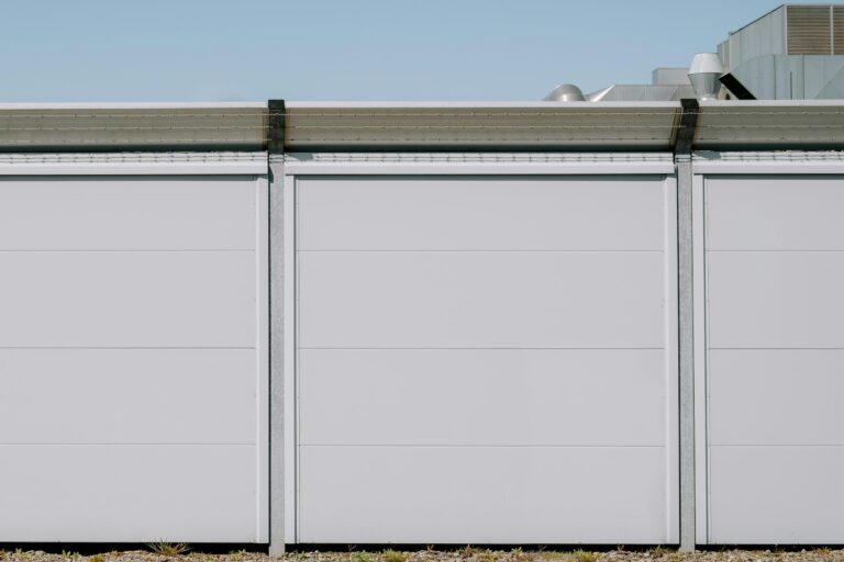 Hyper-realistic product photography of a custom CFRT panel integrated into an RV wall section, emphasizing its lightweight and structural integrity. The panel surface is smooth and modern, with a subtle texture of continuous fiber reinforcement visible. Bright, natural lighting, clean composition, no text, no brand logo.