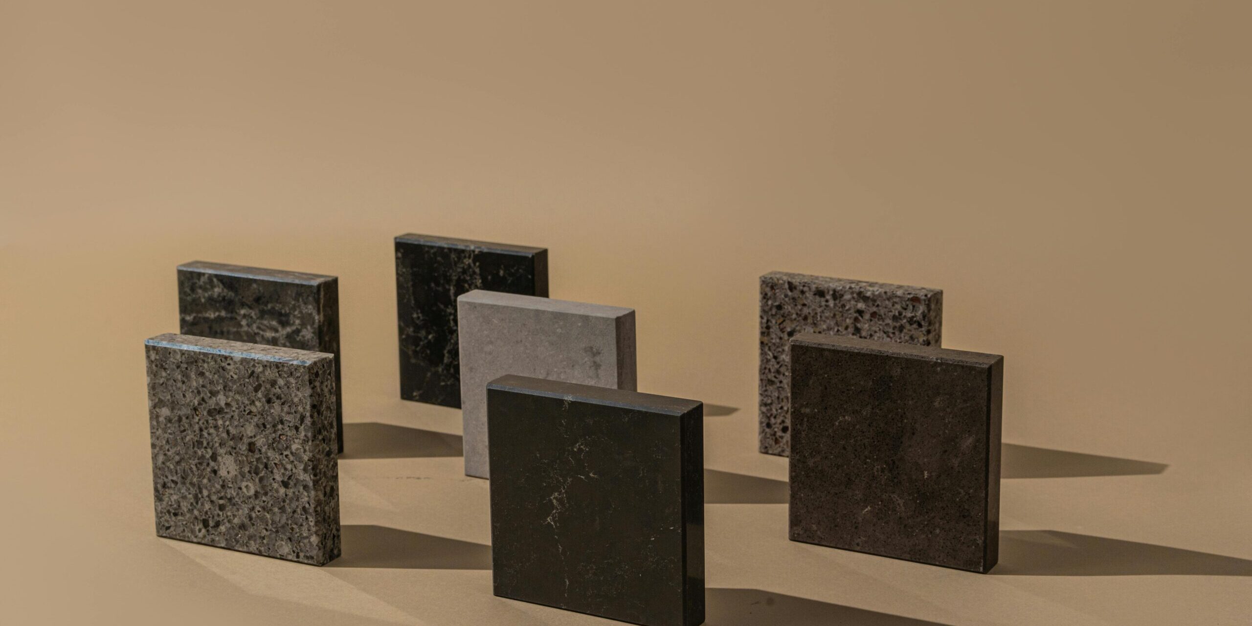 Hyperrealistic Product Photography Of Three Distinct Foam Co Overview Hyper-realistic product photography of three distinct foam core samples: PMI, PET, and PVC, each clearly labeled and showcasing their unique textures and densities. The samples are arranged on a clean, white laboratory surface under bright, even lighting, with a subtle depth of field. No text, no brand logos, clean composition.