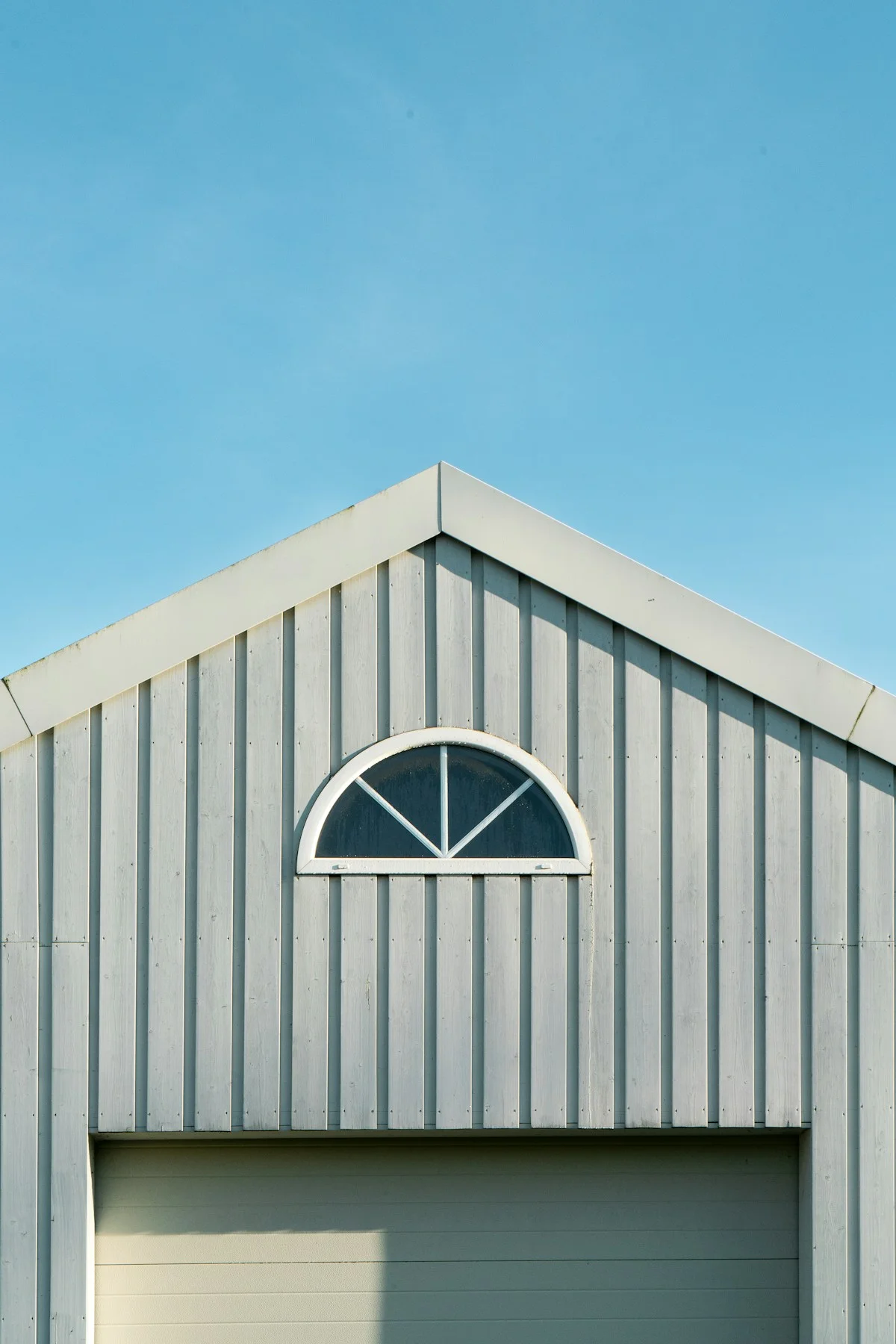 Insulated Garage Door Reinforcing Durability Against Harsh Weather Conditions
