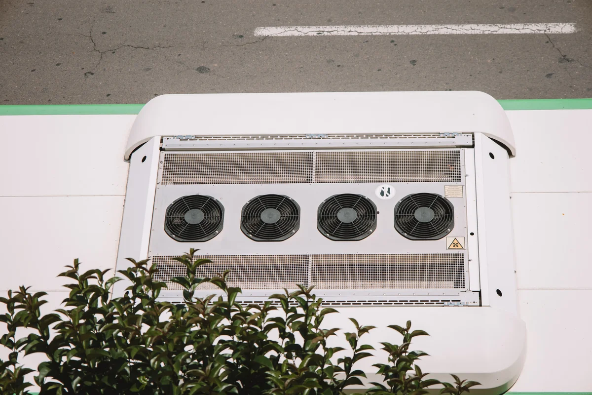 Refrigerated truck body built with production foam core sandwich panels