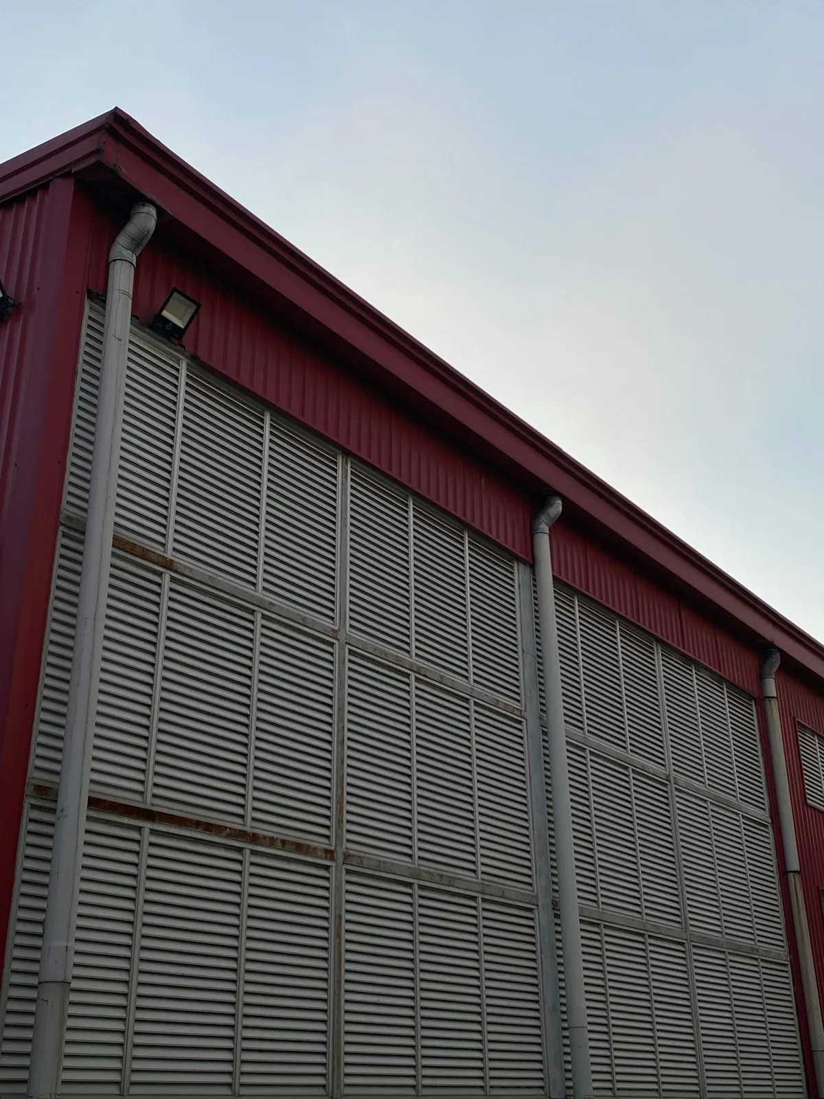 Universal mechanical test frame performing flatwise tensile test on honeycomb sandwich coupon (Source: RaxPanel Quality Assurance Lab)