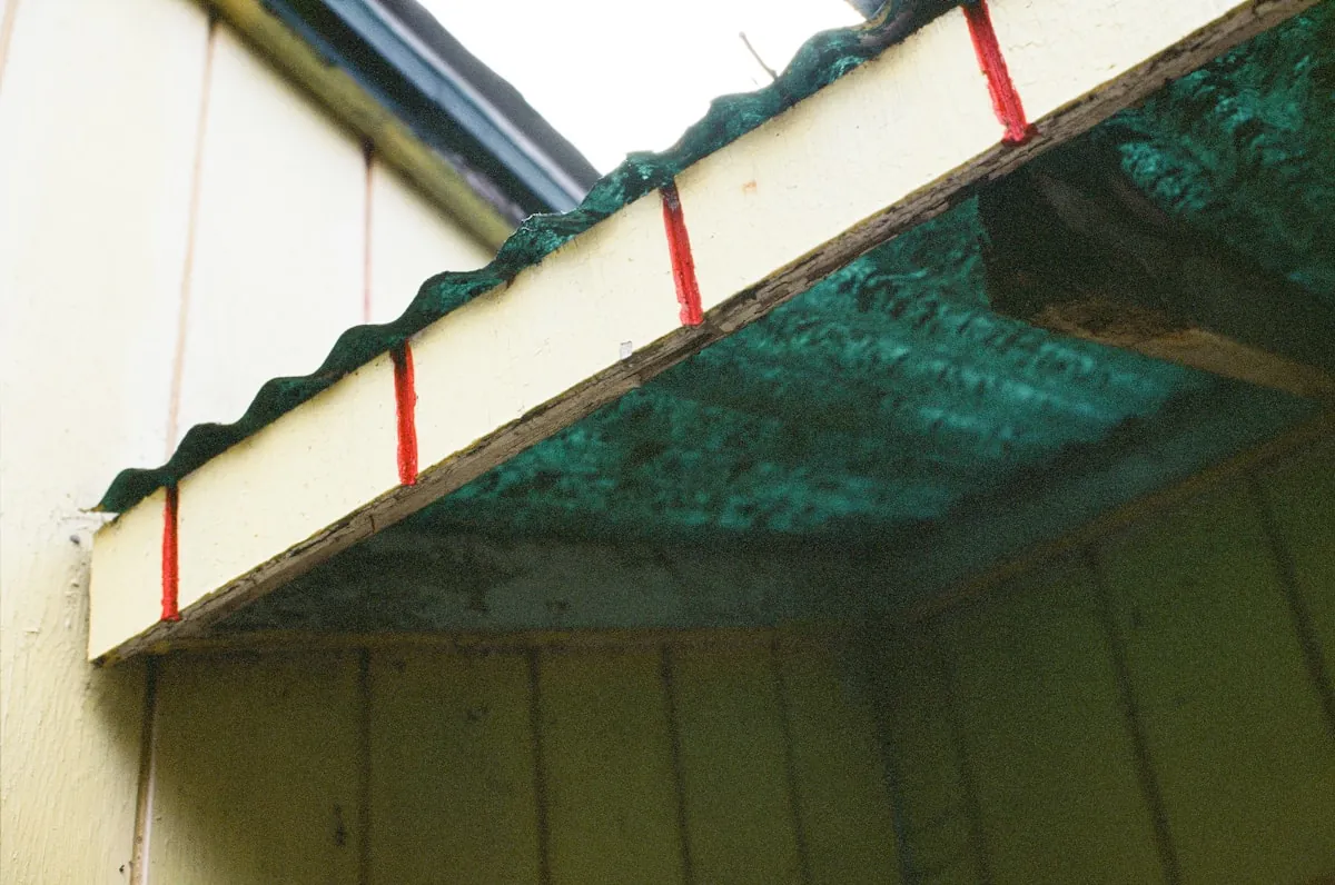 Heavy ball drop impact resistance testing conducted on composite and solid architectural facade panels
