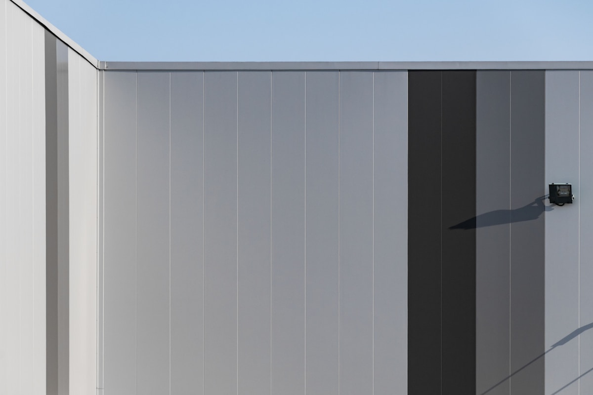 Wall Cladding Finish with Top Trims and Seals